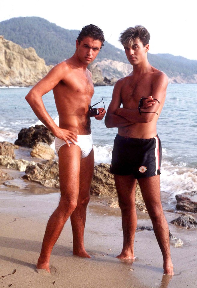 George Michael and Andrew Ridgeley on a beach in Ibiza.