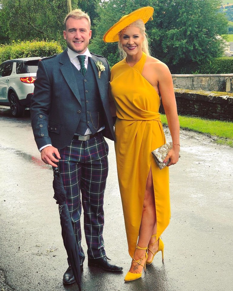 Stuart Hogg and his wife at a wedding.