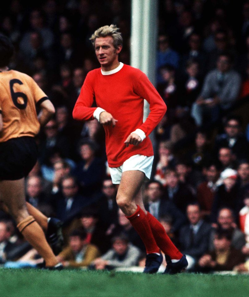 Denis Law playing soccer.