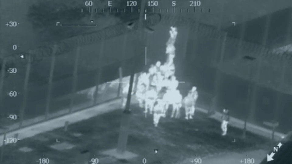 Footage from the night of the breakout shows the four detainees forcing their way through the fence