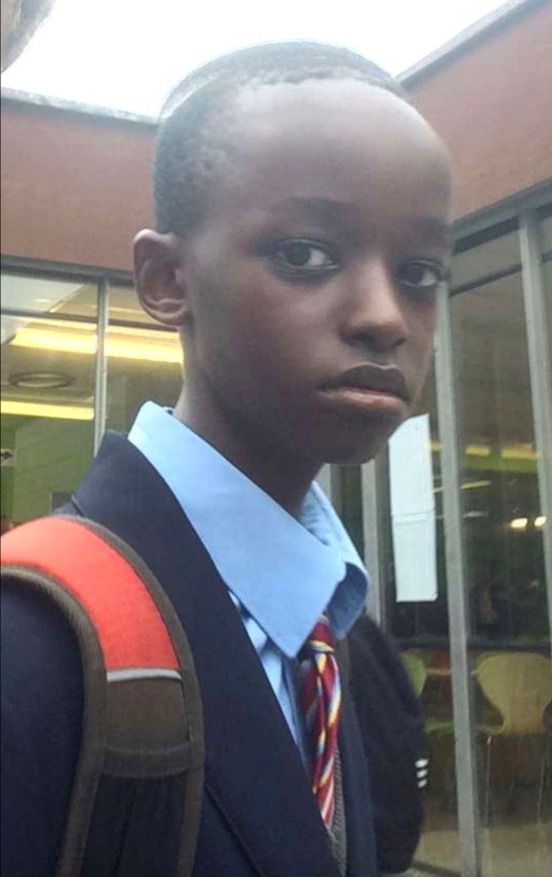 Young Axel Muganwa Rudakubana in school uniform.