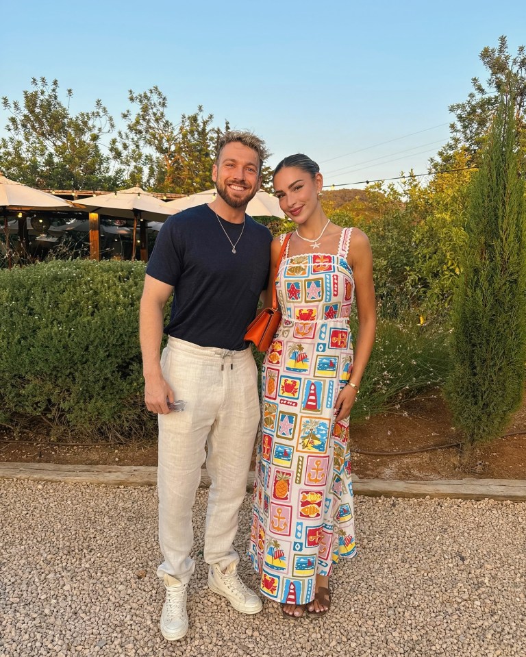 Zara McDermott and Sam Thompson at an outdoor restaurant.