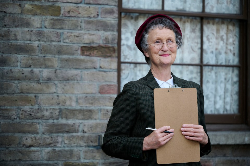 Woman holding a clipboard.