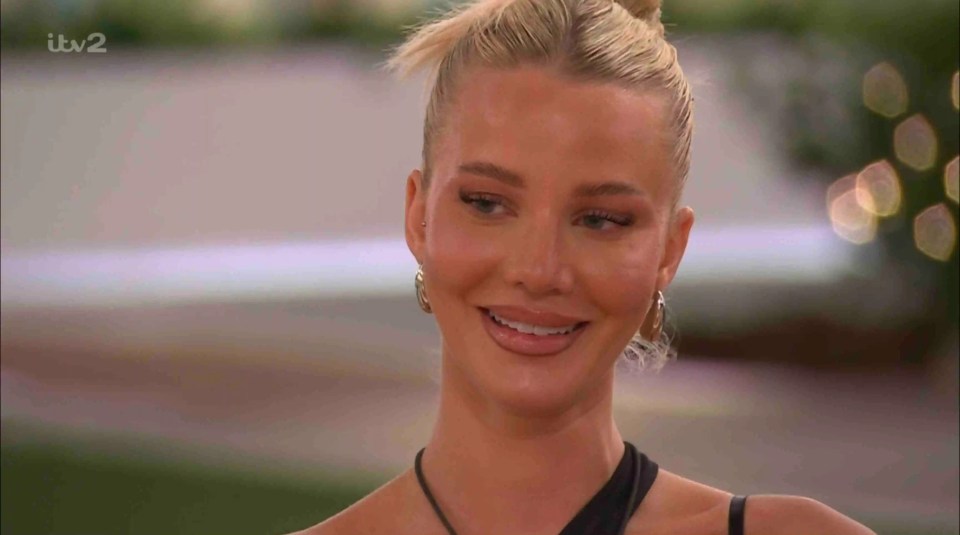 Screenshot of a woman smiling on Love Island.