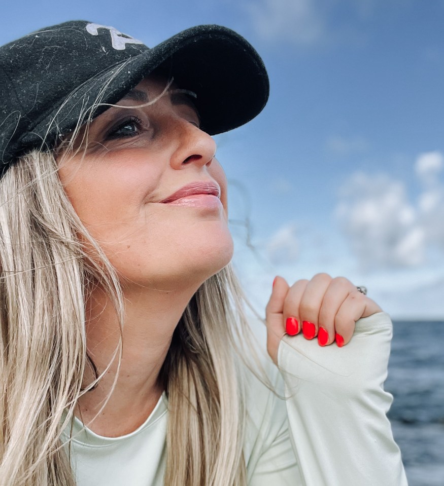 Woman looking out at the ocean.