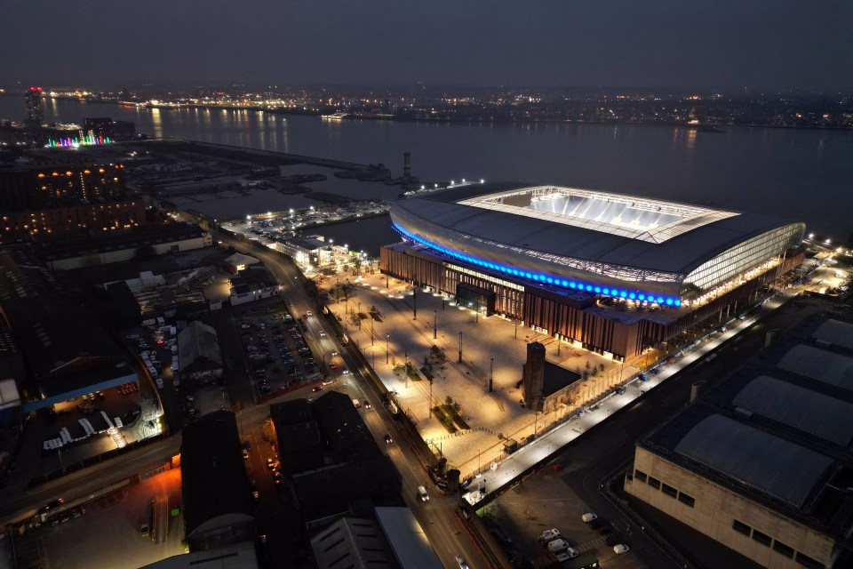 Aerial view of Everton's new stadium at Bramley Moore Dock in Liverpool at night.