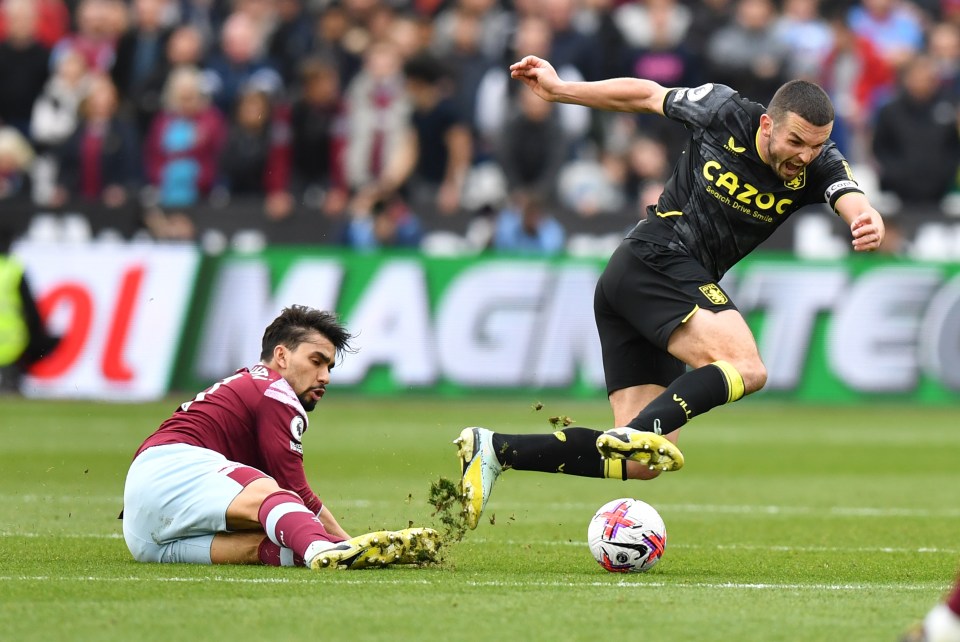 Lucas Paqueta of West Ham United receives a yellow card for a tackle.