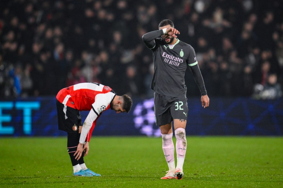 AC Milan's Kyle Walker and Feyenoord's Luka Ivanusec react after a soccer match.