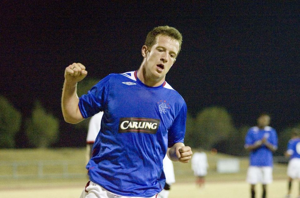 Charlie Adam celebrating a goal in a Rangers pre-season match.