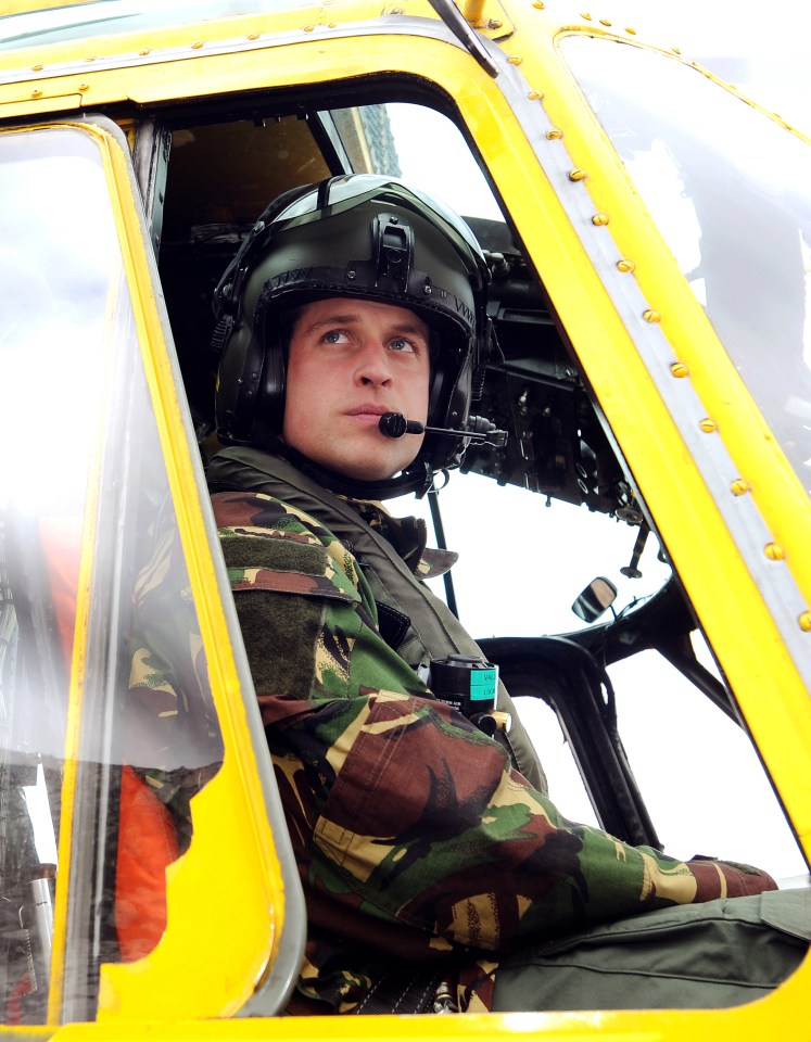 Prince William in a helicopter cockpit.