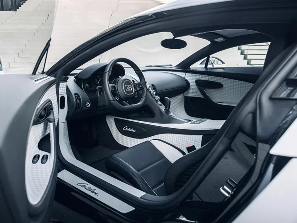 Interior of a white and black Bugatti Centodieci.