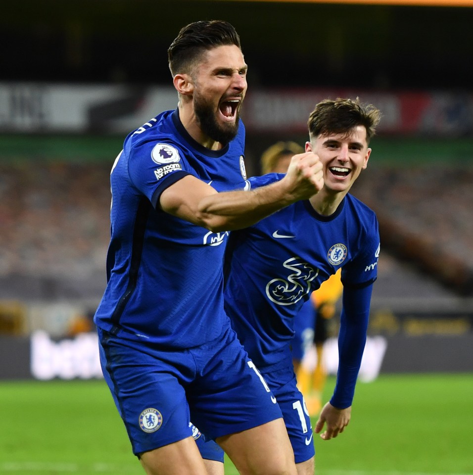 Chelsea soccer players celebrating a goal.