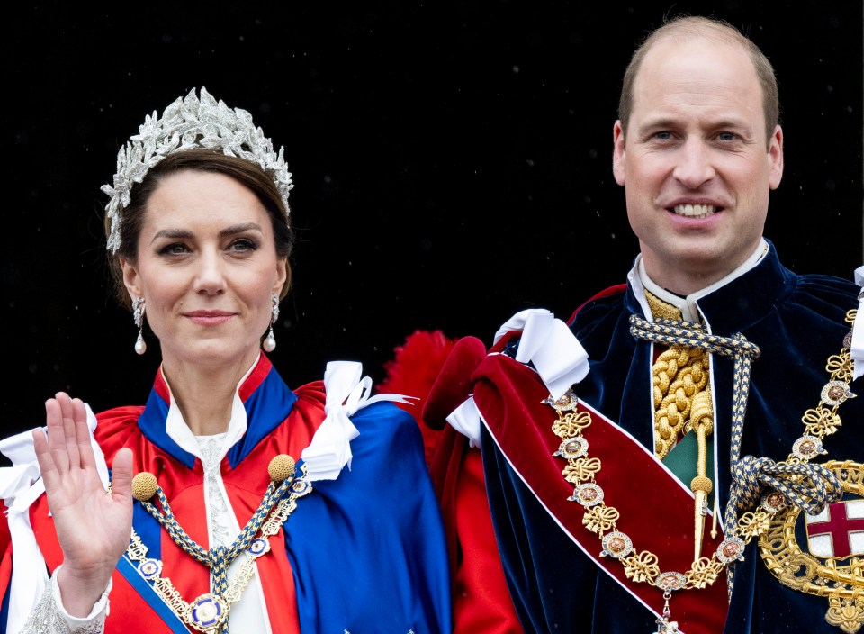 Prince William and Catherine, Princess of Wales, on the Buckingham Palace balcony at the Coronation of King Charles III.