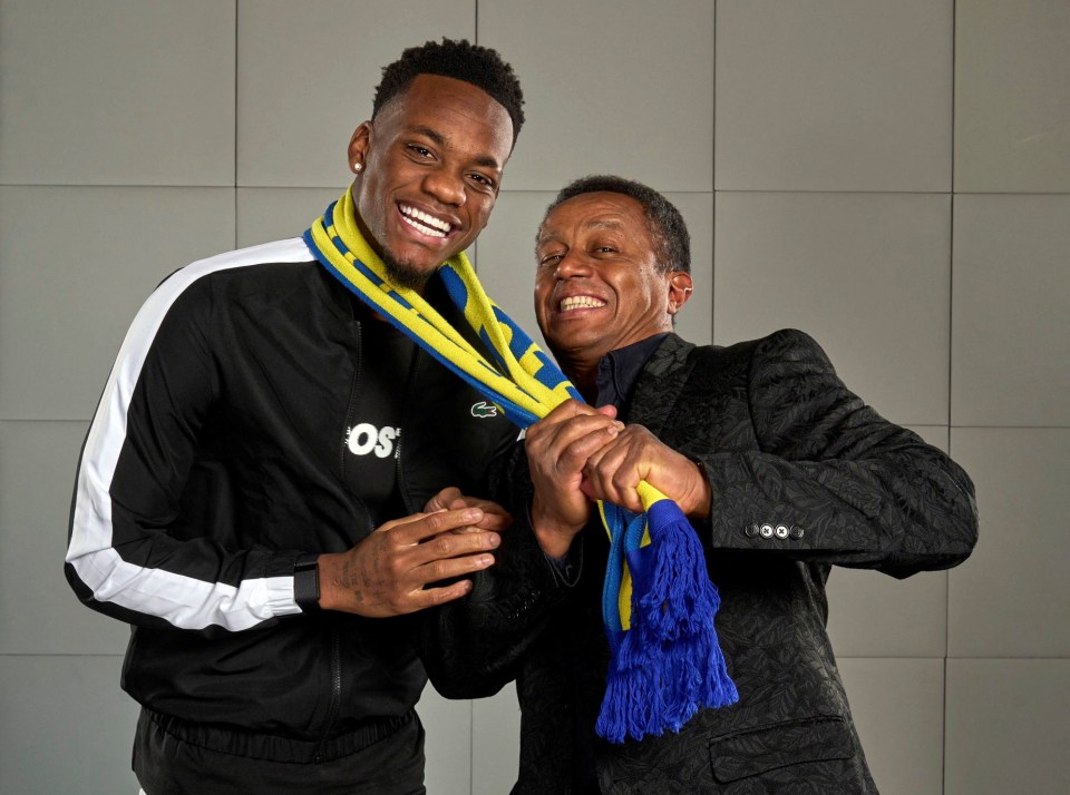 Jhon Duran, new Al Nassr signing, with club representative.