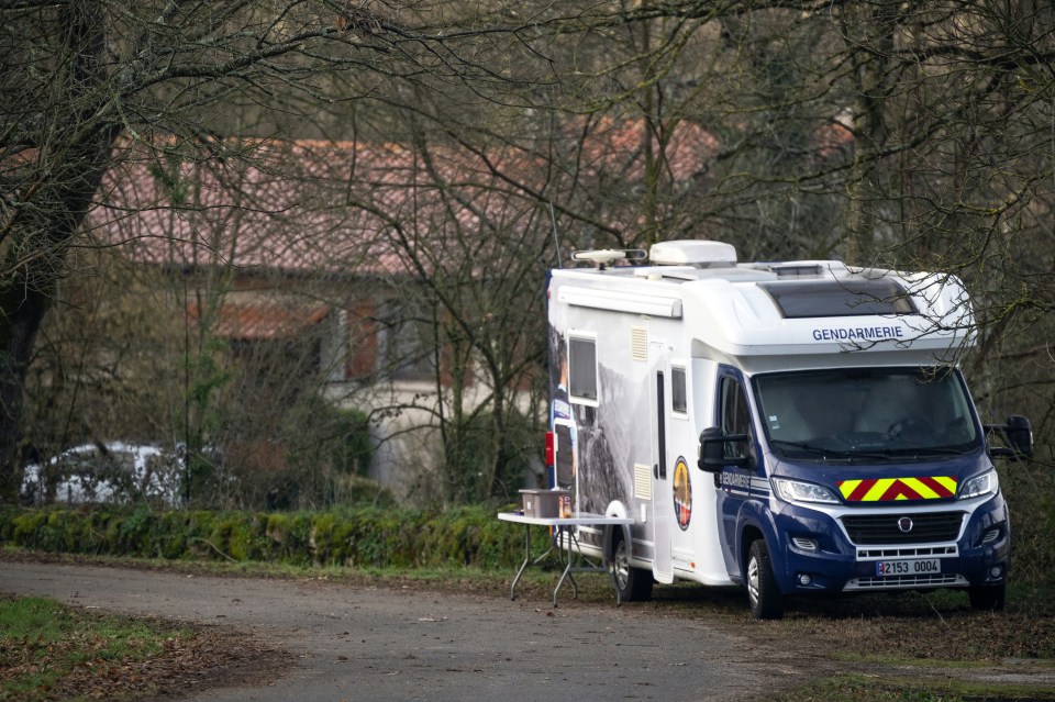 Gendarmerie van parked outside a house where a British couple was found dead.