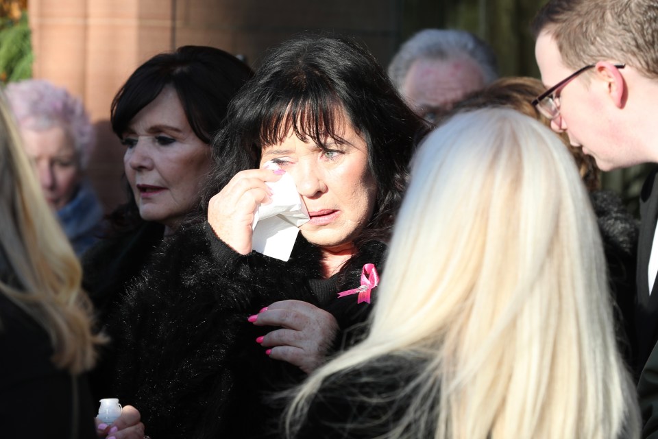 Coleen Nolan crying at her sister's funeral.