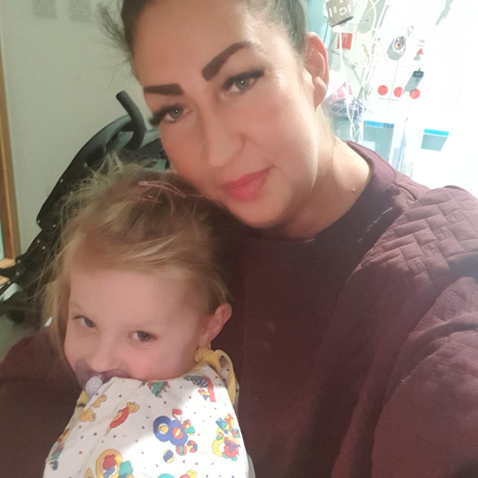 A mother and her five-year-old daughter in a hospital.