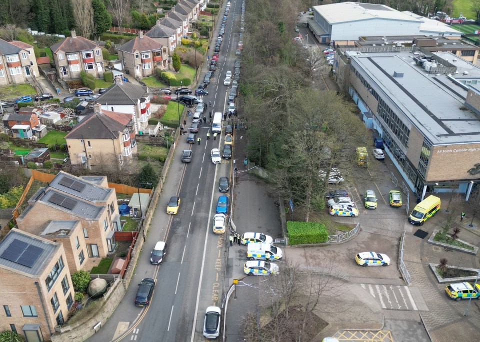 Aerial view of a police scene at All Saints Catholic High School in Sheffield, UK, following a reported stabbing.