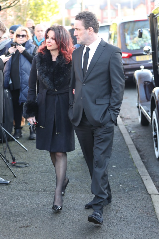 Danny Taylor and a woman arrive at Linda Nolan's funeral.