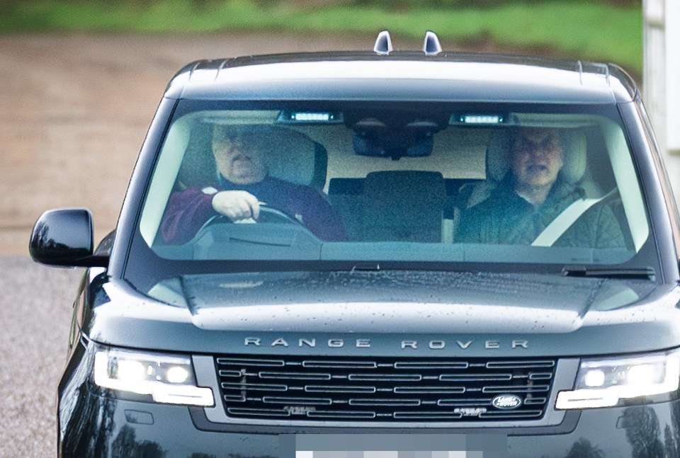 Prince Andrew driving a Range Rover.