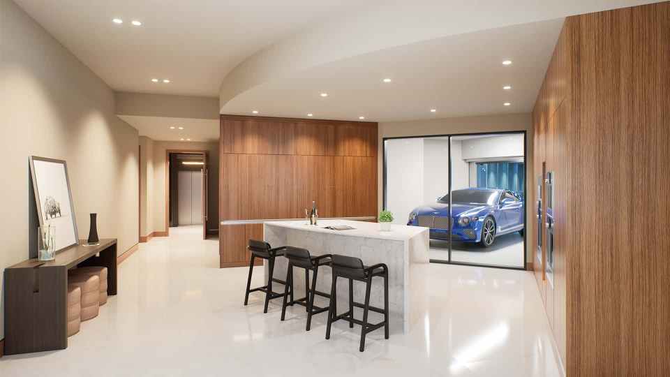 Rendering of a Bentley Residences apartment showing a kitchen island and bar stools with a view of a private garage containing a blue Bentley.