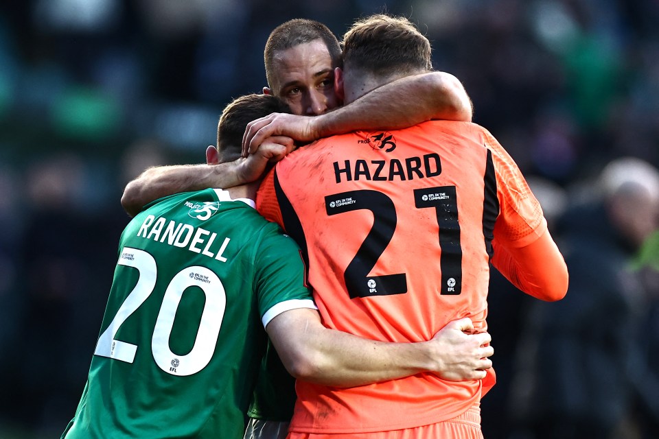 Plymouth Argyle players celebrating a goal.