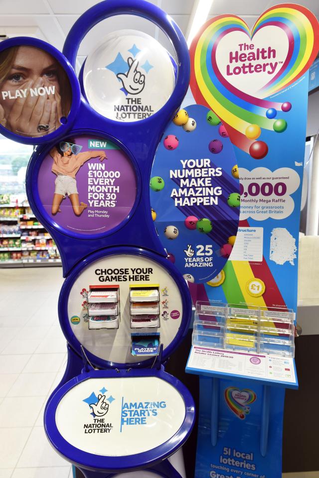 National Lottery tickets display in a supermarket.