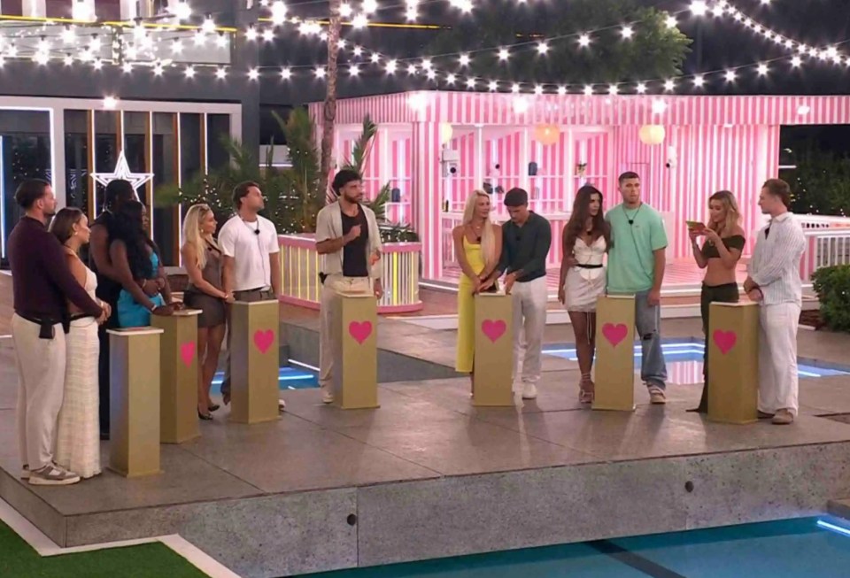 Love Island couples playing a game.