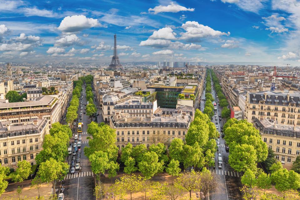 High-angle view of Paris, France, showing the Eiffel Tower in the distance.