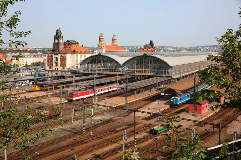 Prague Main Train Station with trains and tracks.