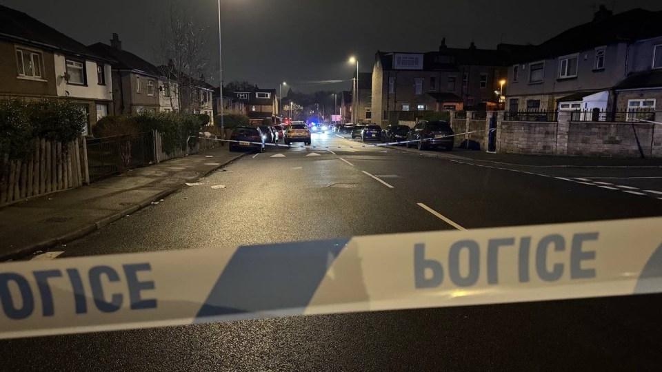 Police tape at a night-time accident scene in Bradford.