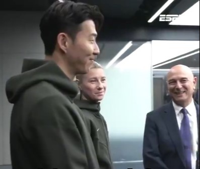 King Charles asking Son Heung-min about Tottenham's team.