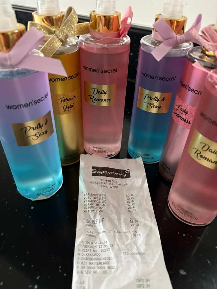 Five women's secret body sprays and a receipt.