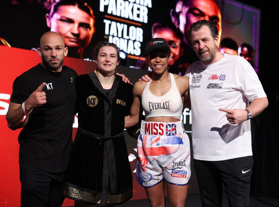 Katie Taylor and Natasha Jonas with their trainers after a title fight.