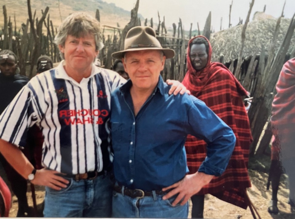 Photo of journalist Garth Pearce with a friend in Africa.