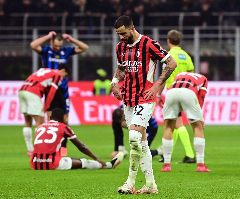 AC Milan's Kyle Walker looking dejected after a soccer match.