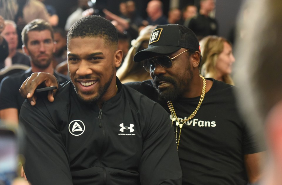 Anthony Joshua and Derek Chisora at a press conference.