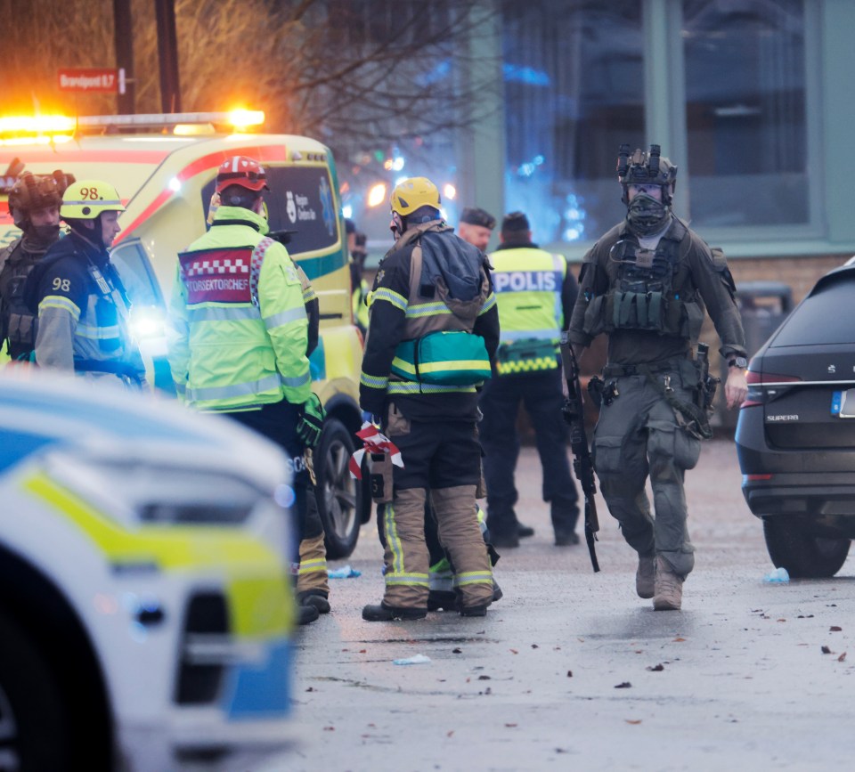 Emergency personnel at a school shooting scene.