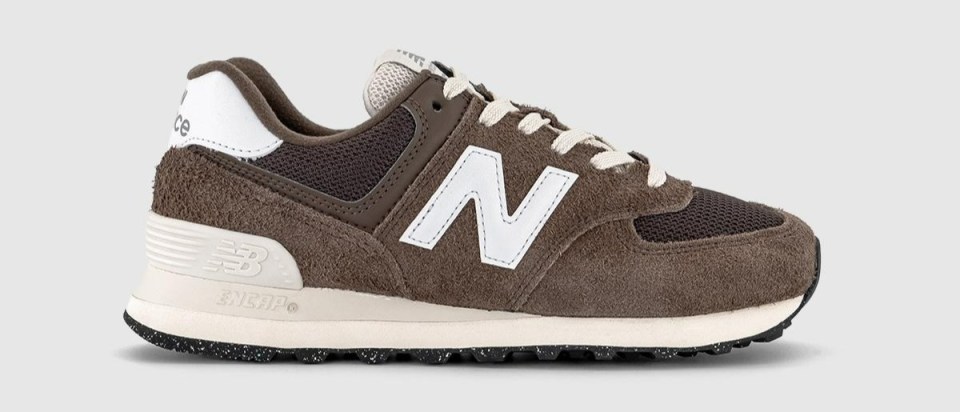 Brown New Balance 574 sneaker.