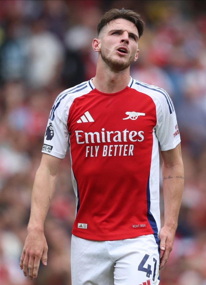 Declan Rice of Arsenal looking dejected during a soccer match.