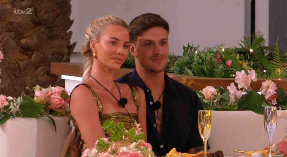 Love Island's Grace and Luca at a dinner party.