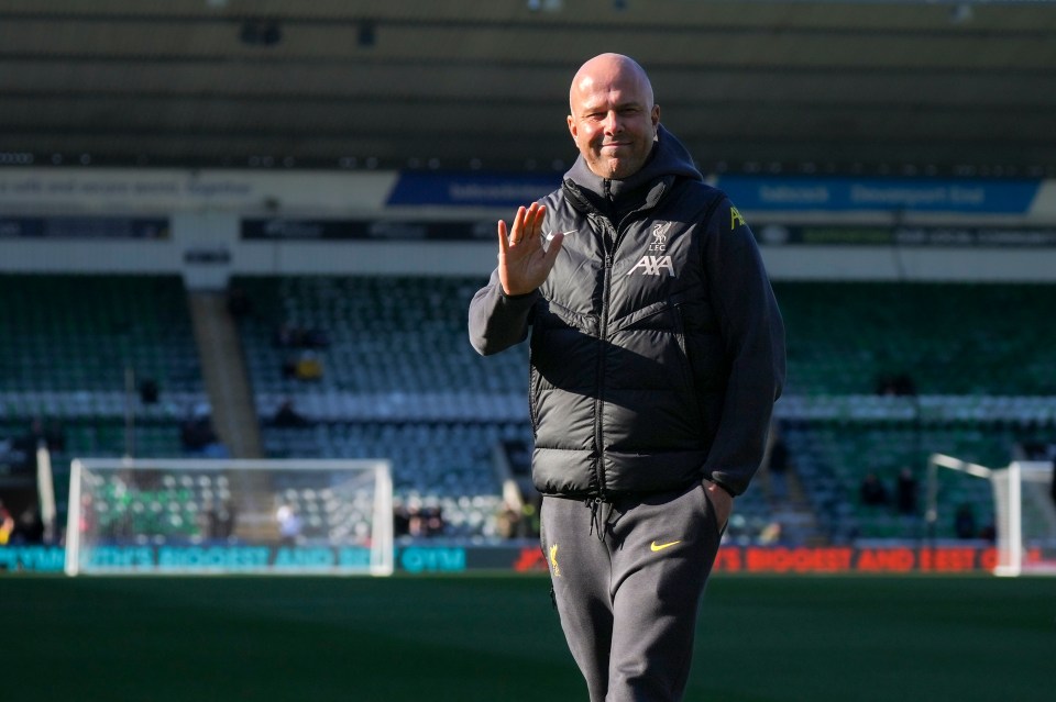 Liverpool's manager Arne Slot waves before the English FA Cup fourth round soccer match between Plymouth Argyle and Liverpool at Home Park stadium in Plymouth, England, Sunday, Feb. 9, 2025. (AP Photo/Alastair Grant)