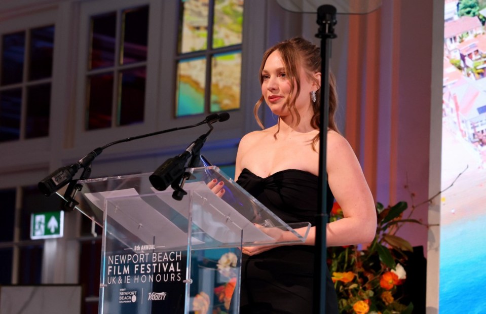 LONDON, ENGLAND - FEBRUARY 13: Mia Threapleton on stage with her Breakout Artist Award, during the Newport Beach Film Festival UK & IE Honours 2025 on February 13, 2025 in London, England. (Photo by Max Cisotti/Sam Simpson/Dave Benett/Getty Images for Newport Beach Film Festival)