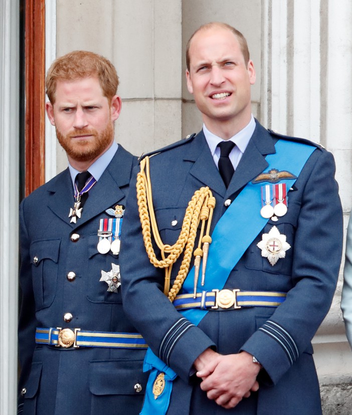 LONDON, UNITED KINGDOM - JULY 10: (EMBARGOED FOR PUBLICATION IN UK NEWSPAPERS UNTIL 24 HOURS AFTER CREATE DATE AND TIME) Prince Harry, Duke of Sussex and Prince William, Duke of Cambridge watch a flypast to mark the centenary of the Royal Air Force from the balcony of Buckingham Palace on July 10, 2018 in London, England. The 100th birthday of the RAF, which was founded on on 1 April 1918, was marked with a centenary parade with the presentation of a new Queen's Colour and flypast of 100 aircraft over Buckingham Palace. (Photo by Max Mumby/Indigo/Getty Images)