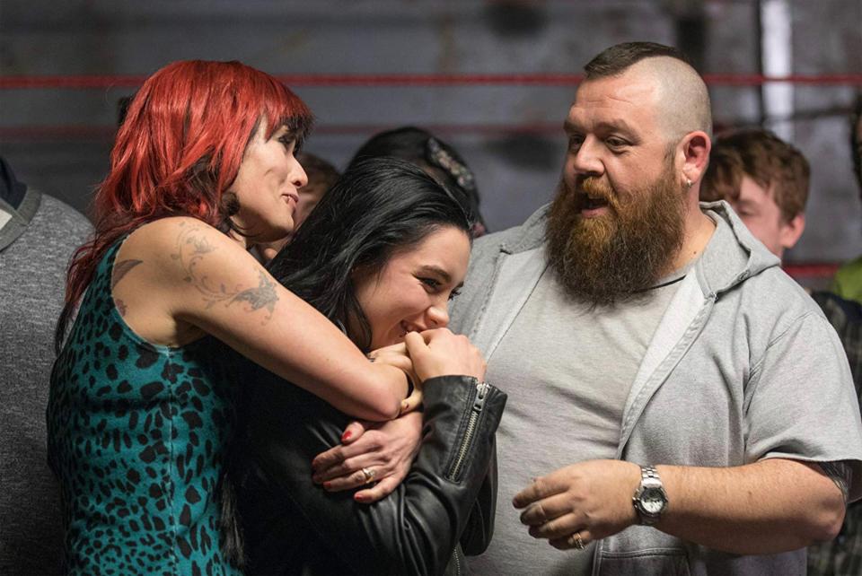 Lena Headley, Florence Pugh, and Nick Frost in a scene from the film Fighting with My Family.