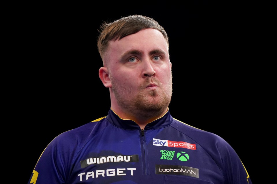 Luke Littler at a darts match.