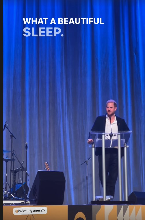 Prince Harry speaking at a podium.