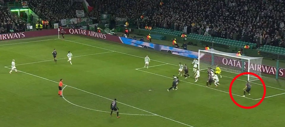 Soccer player near the goal during a game.