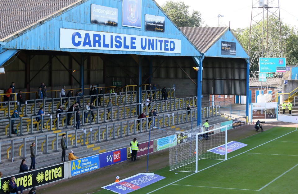 Fans at a Carlisle United soccer match.