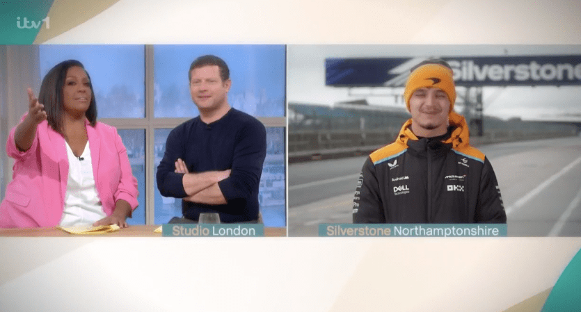 Screenshot of a TV show split screen showing two presenters in a London studio and a racing driver at Silverstone.